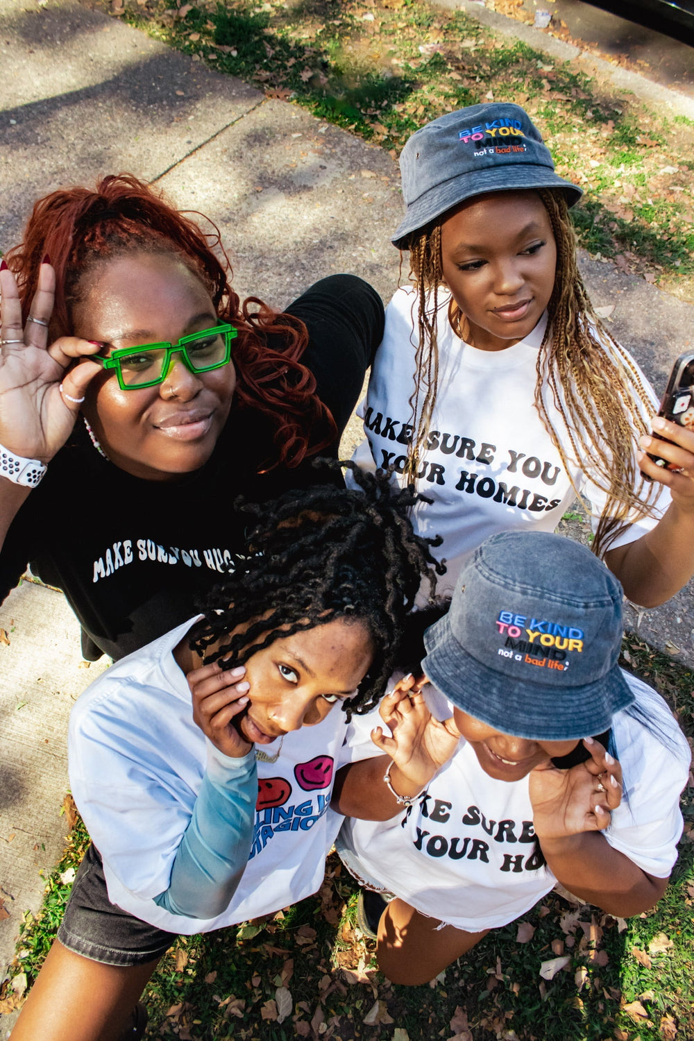 four-friends-posing-with Not-A-Bad-Life-Bucket hats