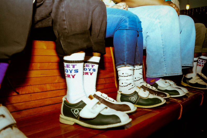Friends wear Let Boys Cry socks